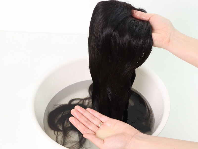 Washing with wig shampoo for human hair