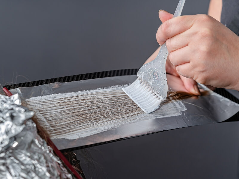 Step 4 on how to dye a human hair wig: applying the dye