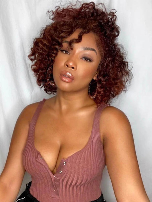 A graduated bob with a curly texture adds a playful and voluminous touch.