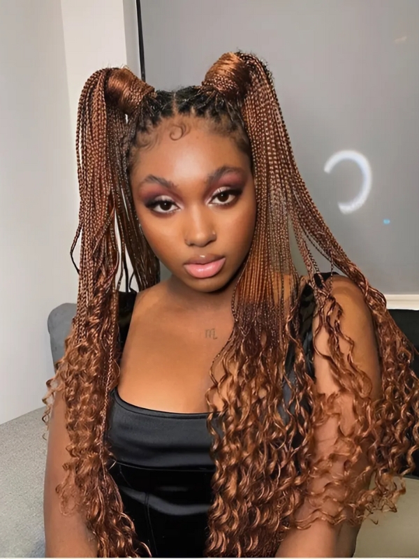 Box braid pigtails are a playful way to showcase long braids.