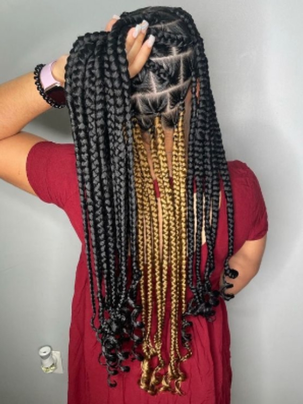 Gold peek a boo knotless braids are great for adding a touch of sophistication to your look.