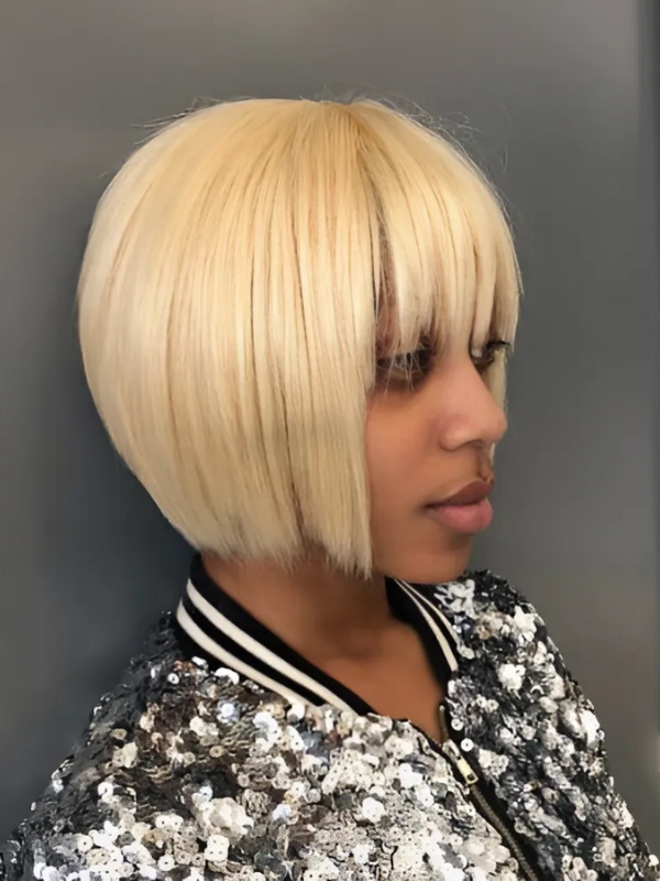 Opt for a playful blonde jaw-length bob paired with a cute, choppy fringe.