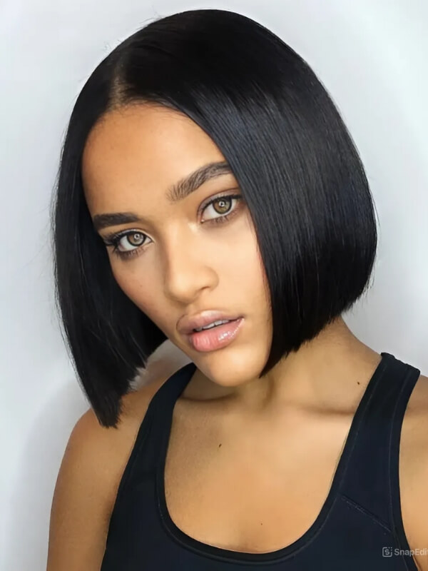 A blunt bob with a middle part offers sleek, straight lines for a polished look. 