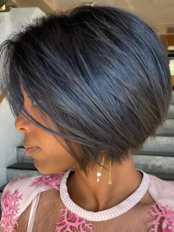 A classic stacked bob haircut pairs beautifully with dark hair and darker skin tones.